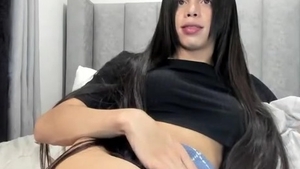 lengthy dark Hair Transgirl Tugs Her big penis On web camera